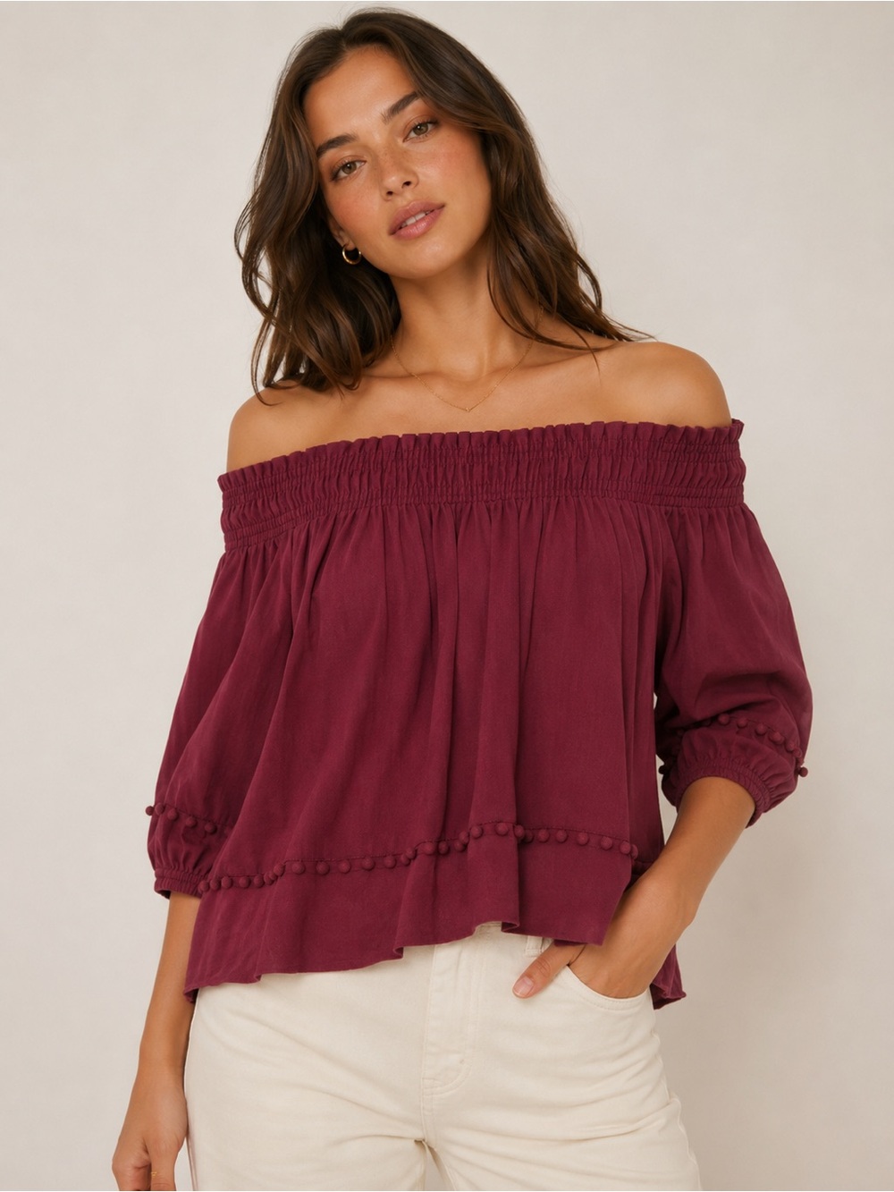 Apiece Apart 100% Cotton Off-Shoulder Pom-Pom Detail Blouse in Burgundy